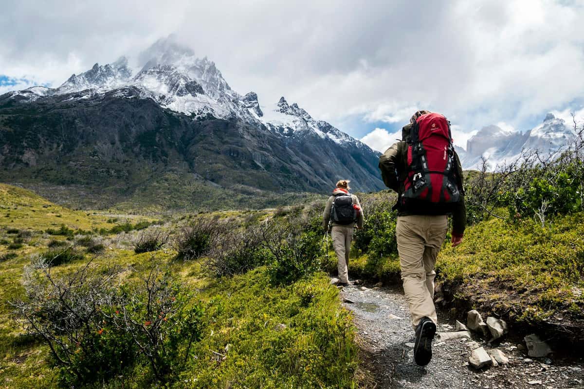 A person walking up a mountain path